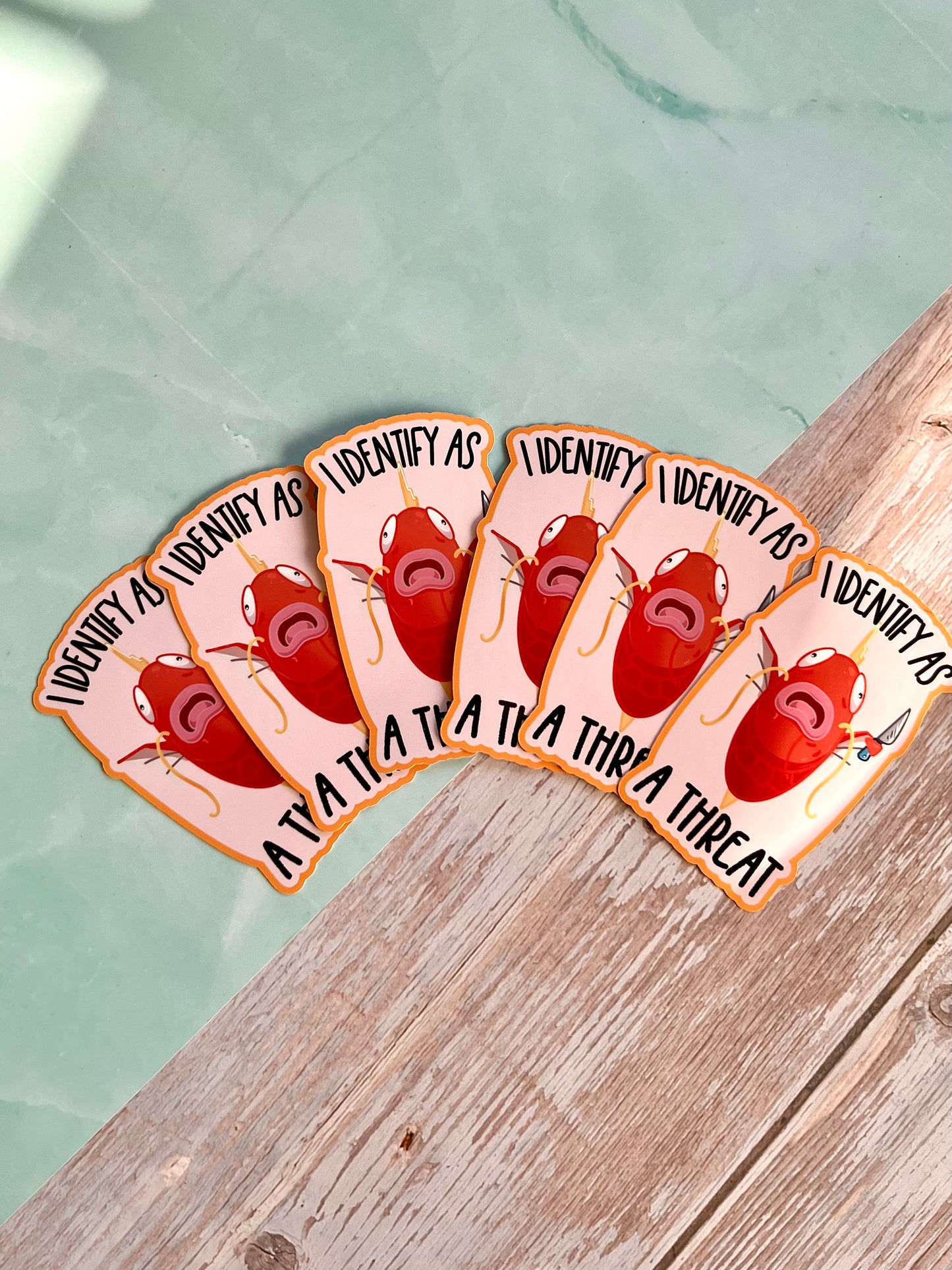 I Identify as a Threat Sticker - glossy or holographic